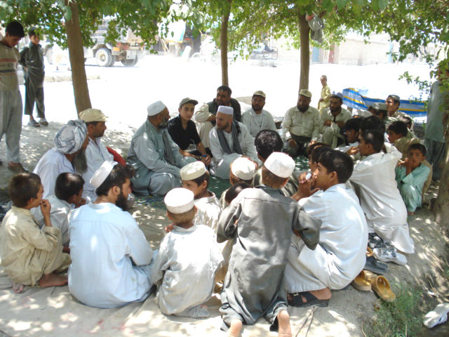 CRAA members at a monthly meeting with locals in Nangarhar province to discuss the community's needs.